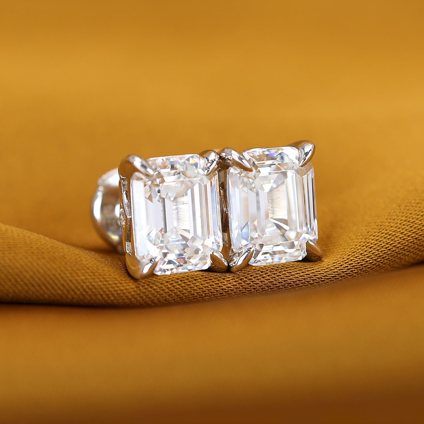 Micro-setting emerald-cut Lab created stones ear studs, sterling silver. (13 carat in total)