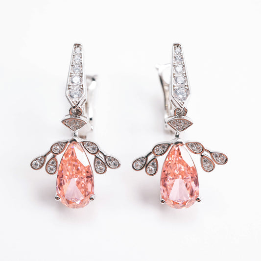 Micro-setting Morganite color Lab created stones Angel's Wings earrings. sterling silver.