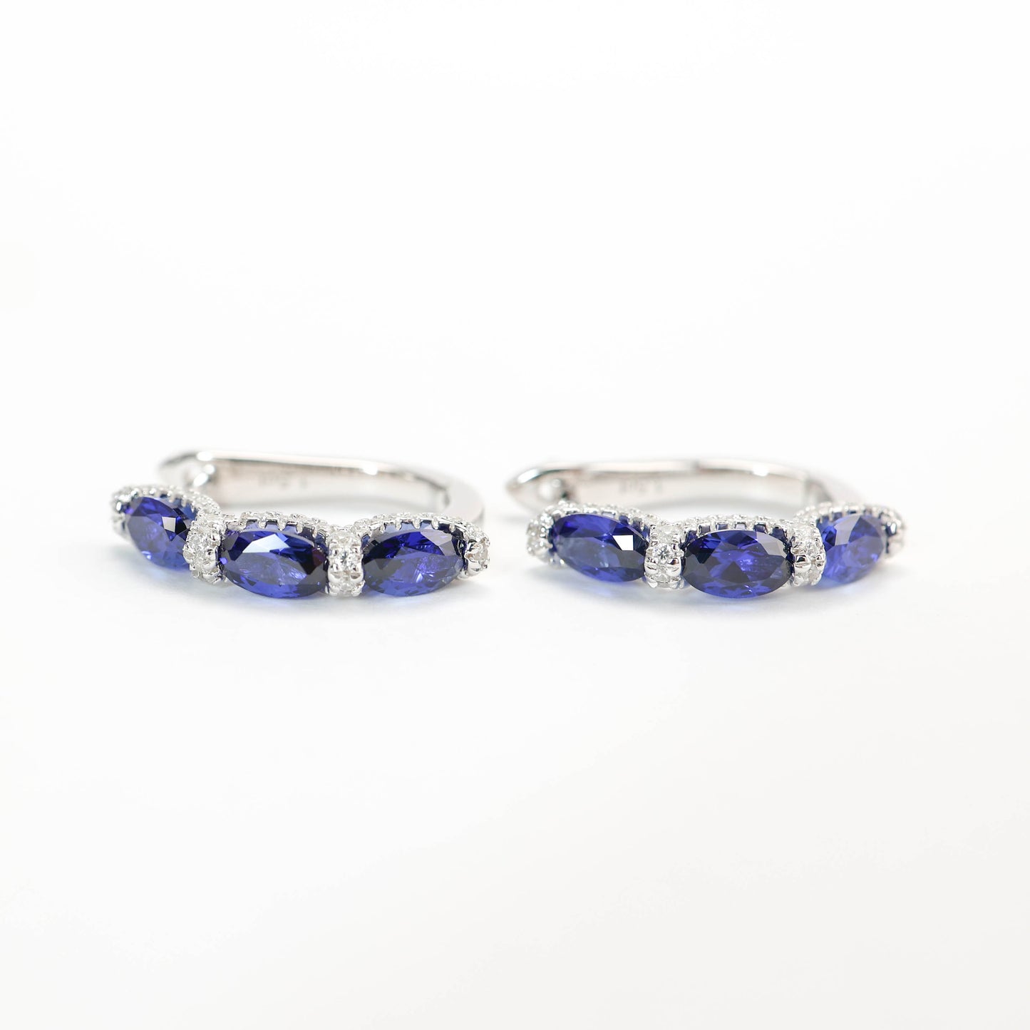 Micro-setting Sapphire color Lab created stones ear loop, sterling silver