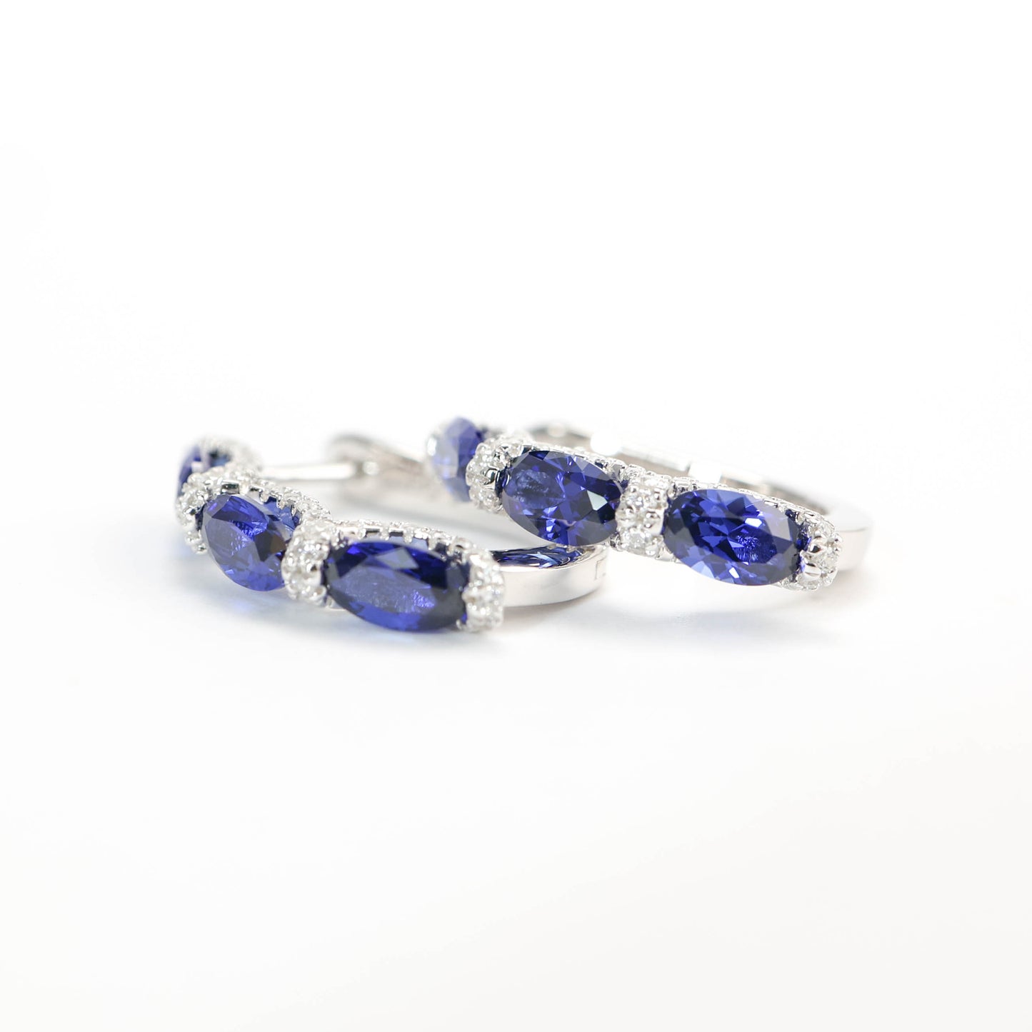 Micro-setting Sapphire color Lab created stones ear loop, sterling silver