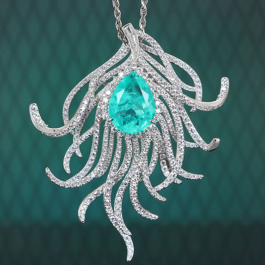 Pierres créées par le laboratoire de couleur Paraiba micro-serti, pendentif et broche polyvalents en plumes d'aurore, argent sterling.