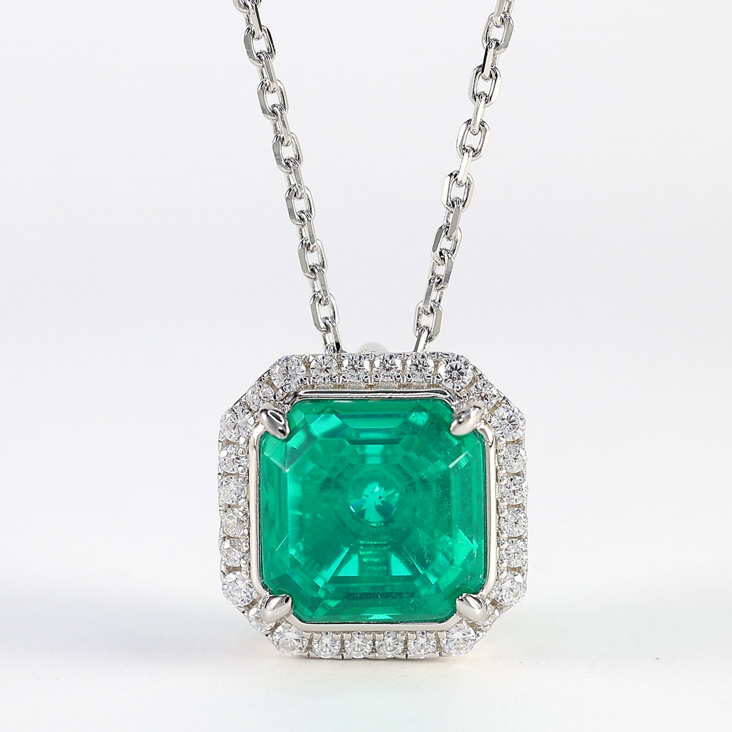 Micro-setting Emerald color Lab created stones 4 prong necklace, sterling silver.