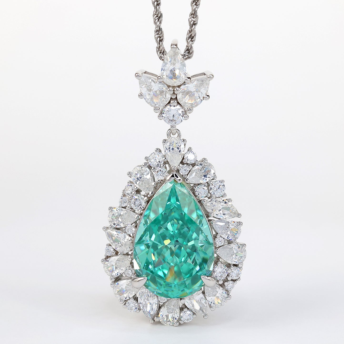 Collier goutte d'eau couleur Paraiba micro-serti, argent massif. (20,75 carats)