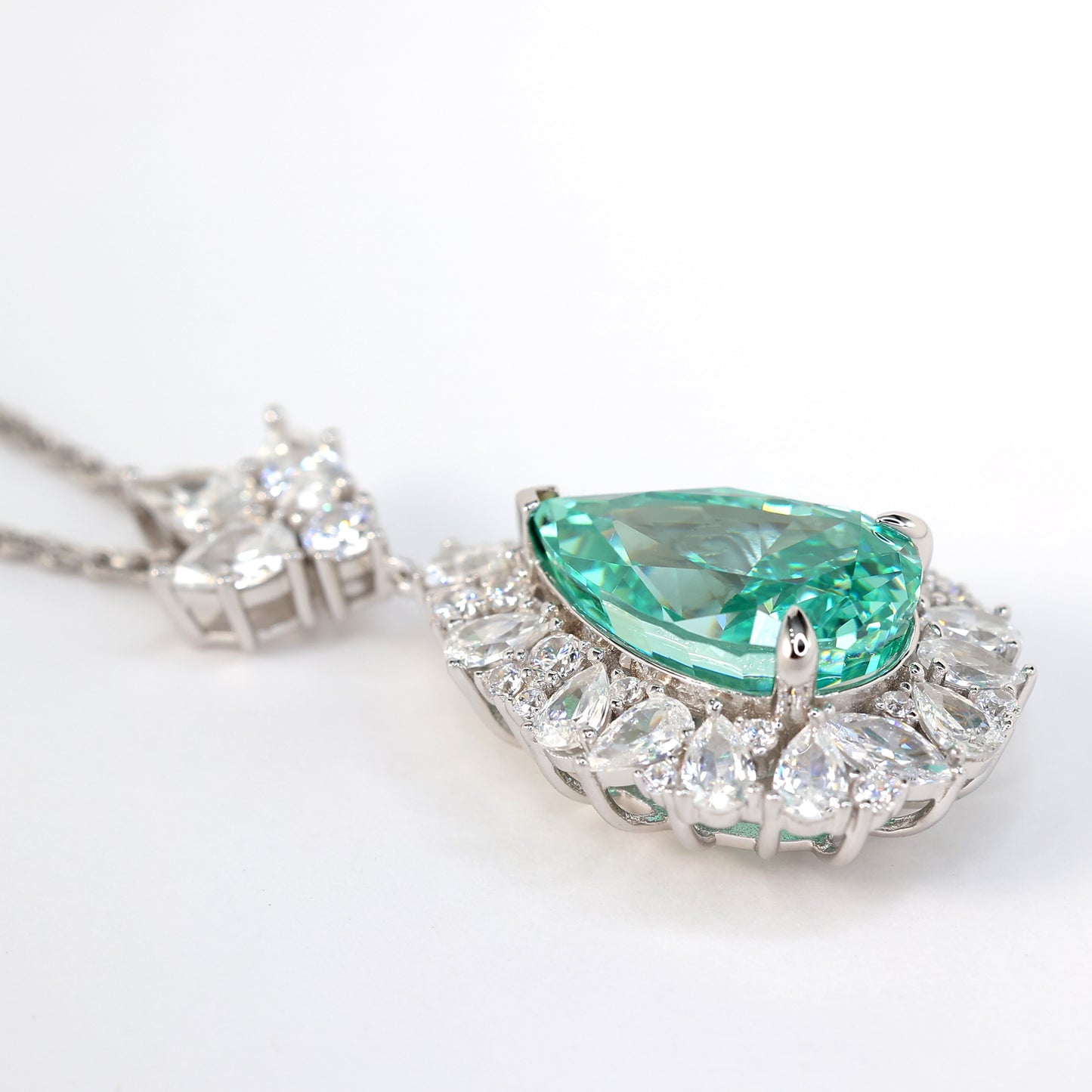 Collier goutte d'eau couleur Paraiba micro-serti, argent massif. (20,75 carats)