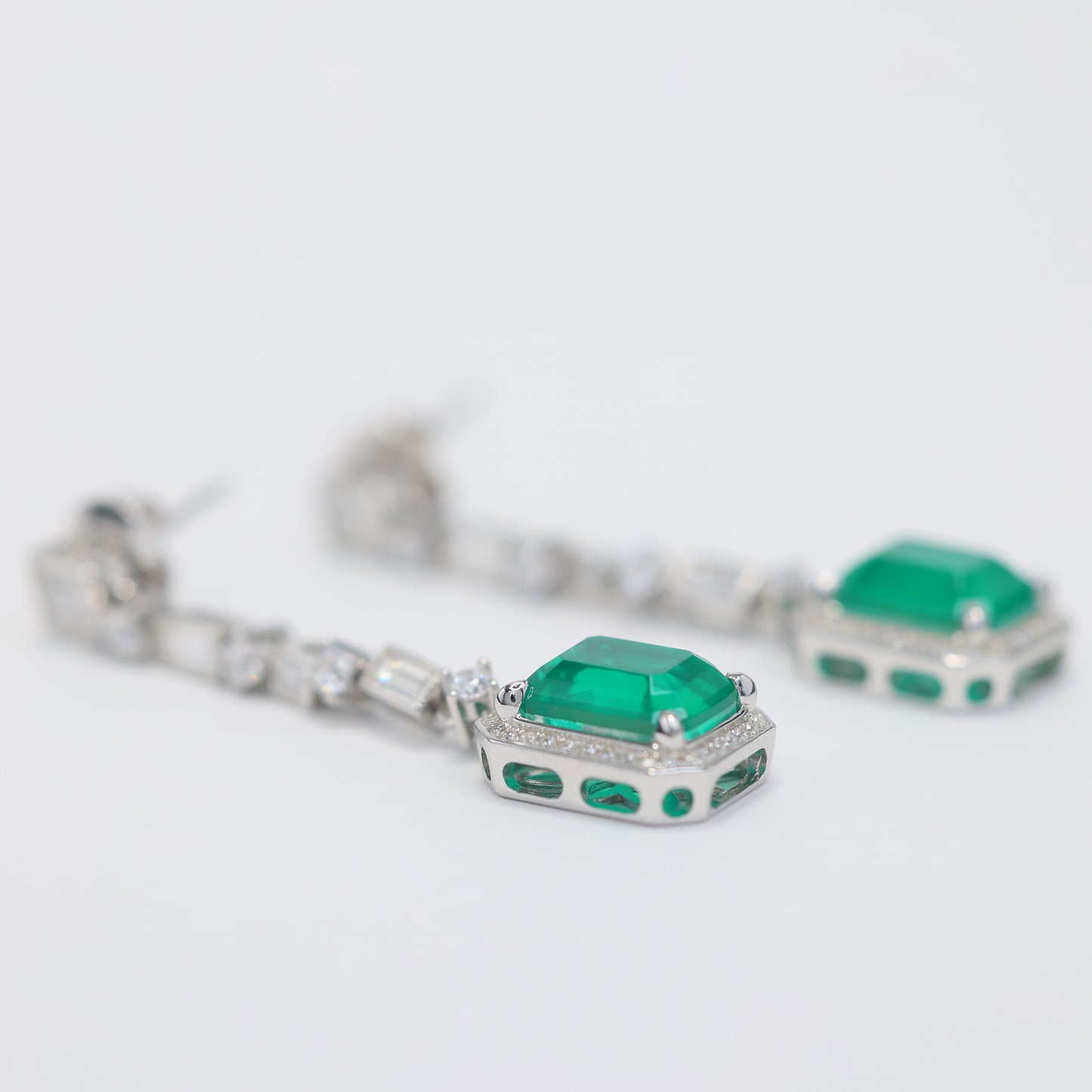 Micro-setting rectangular shape emerald color Lab created stones 4 prong earrings, sterling silver