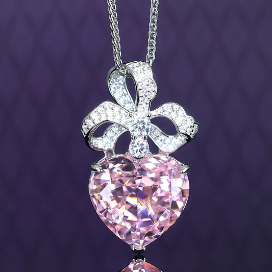 Micro-setting pink diamond color Lab created stones fancy bow necklace, sterling silver.