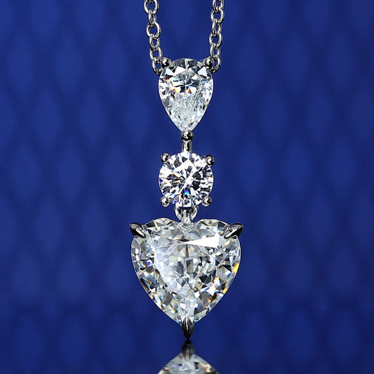 Collier larme et coeur en pierres créées par Micro-set Lab, argent sterling.