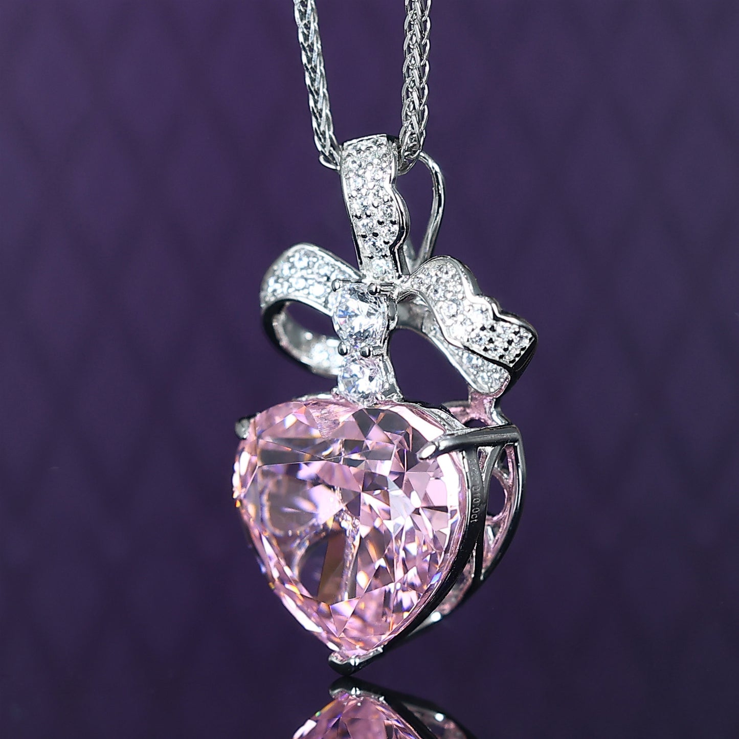 Micro-setting pink diamond color Lab created stones fancy bow necklace, sterling silver.