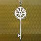 Micro-setting Yellow diamond color Lab created stones lace key detailed pendant, sterling silver.